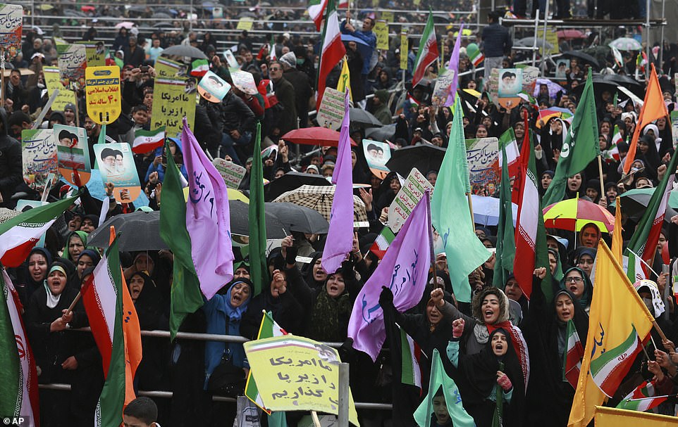 Iraníes celebran el 40 aniversario de la Revolución Islámica - 9669508-6690581-large-crowds-were-seen-carrying-iranian-flags-and-chanting-death-a-19-1549888739058