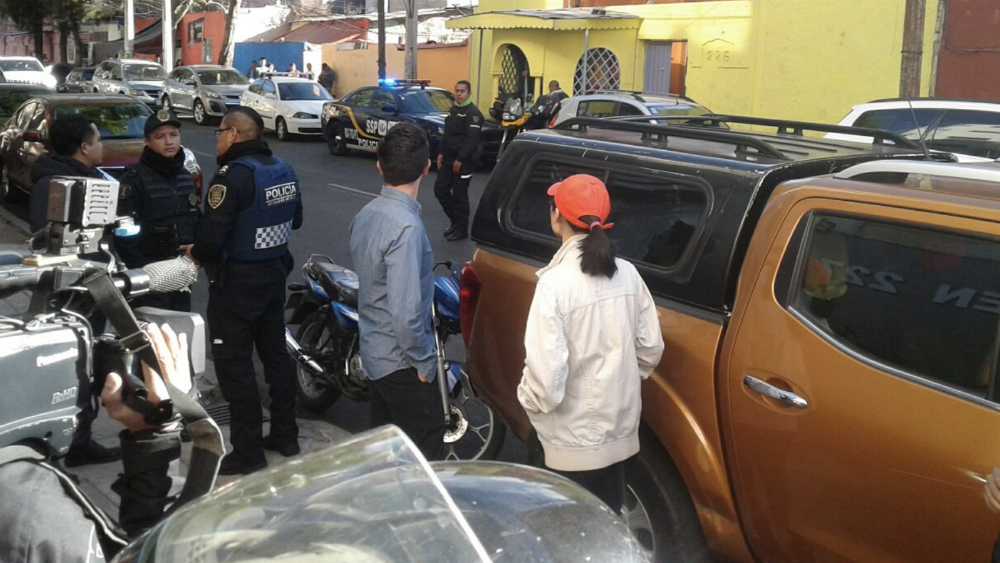 Detienen a mujer china por fotografiar a niños de escuela primaria