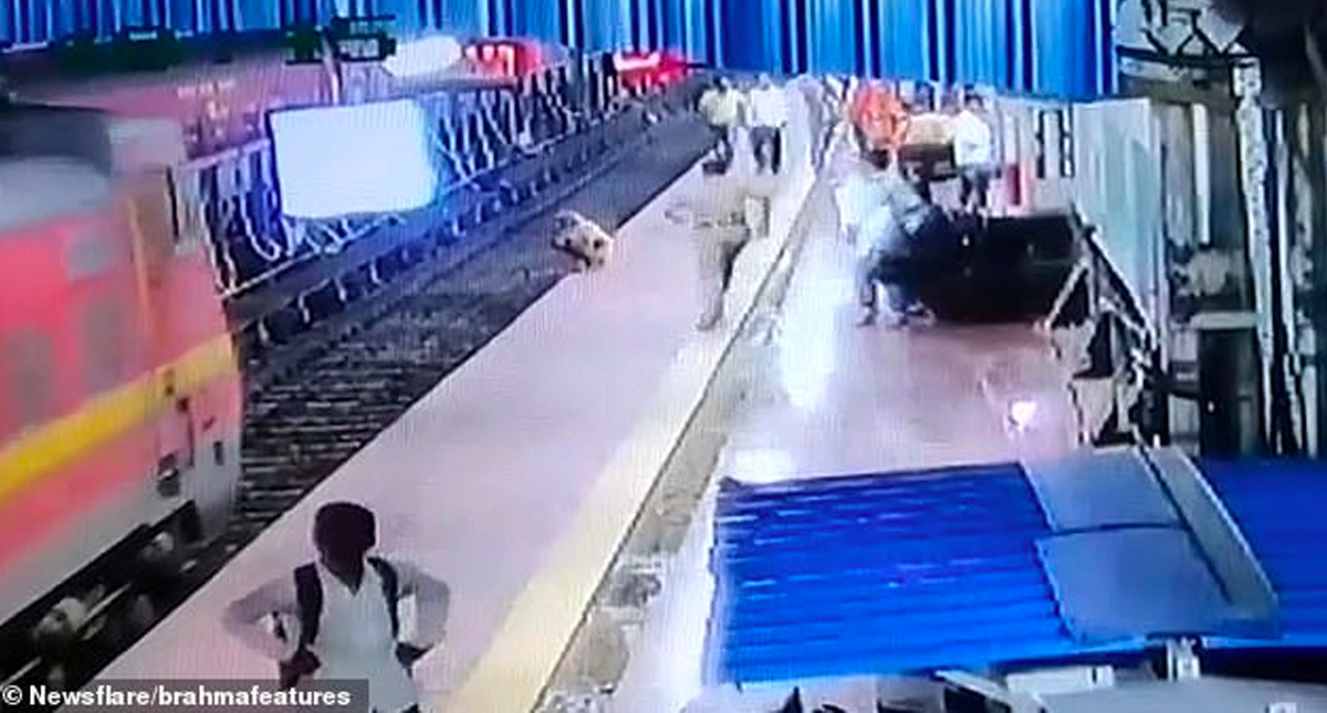 #Video Policía salva a anciano sordo de ser arrollado por el tren