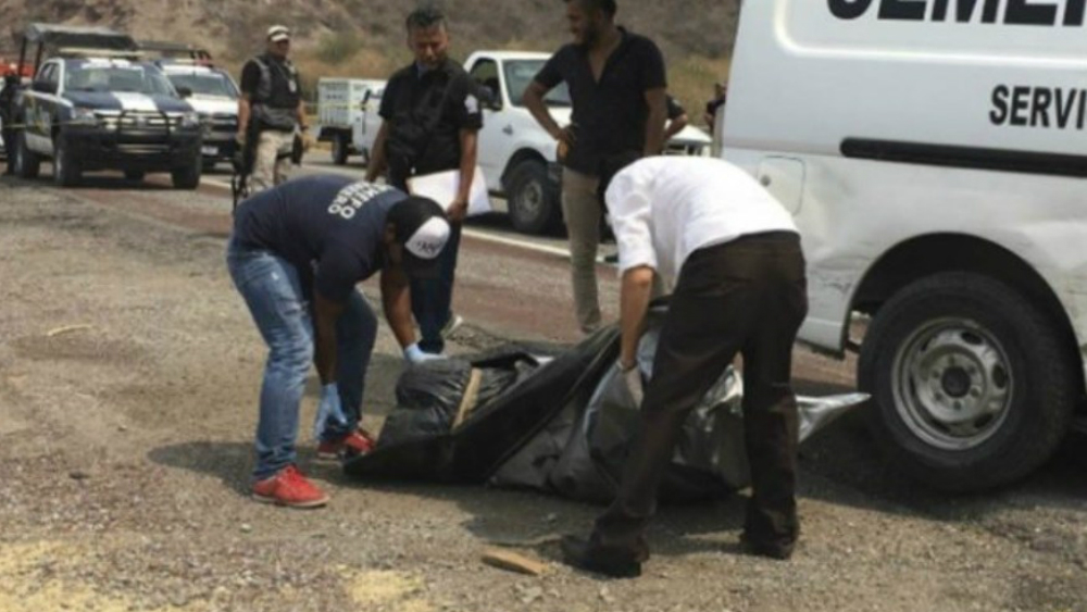 Cuerpos hallados en canal de aguas en Jalisco son de 10 personas