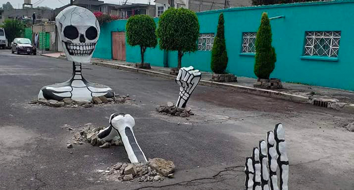 #Viral Vecinos de Tláhuac decoran calles con calaveras gigantes