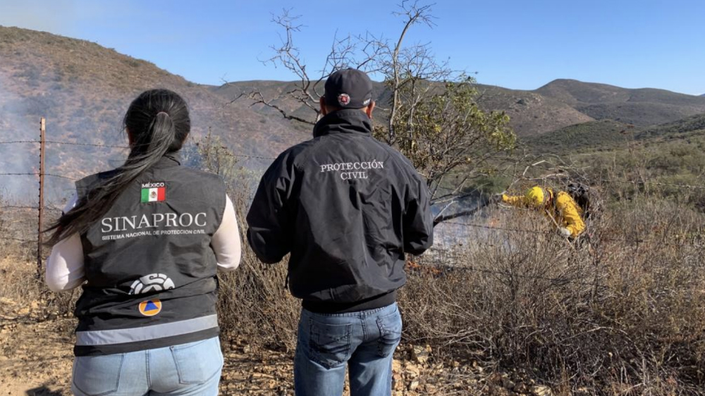 Continúa combate en dos incendios activos en Baja California Continúa combate en dos incendios activos en Baja California