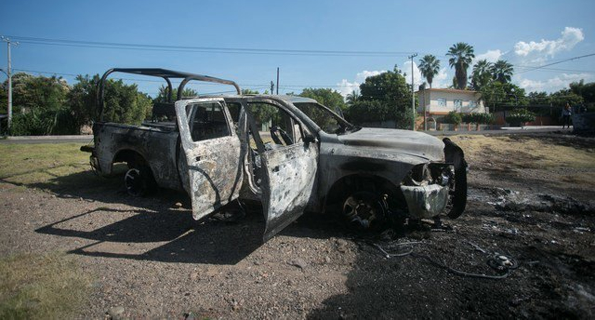 Continúan peritajes por asesinato de 13 policías en Aguililla, Michoacán