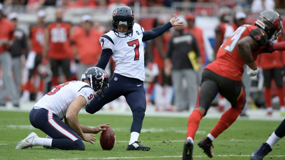 Texanos vencen a Tampa y amarran título divisional de NFL