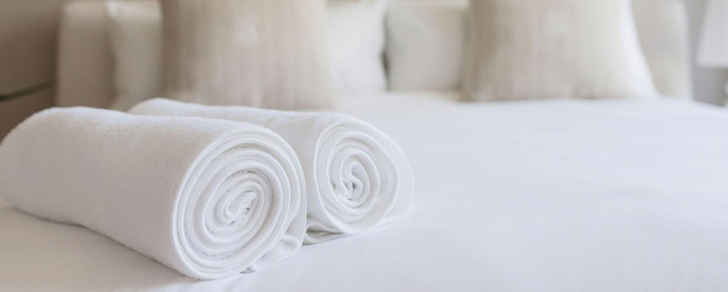 Guía para viajar de una manera sustentable - toalla