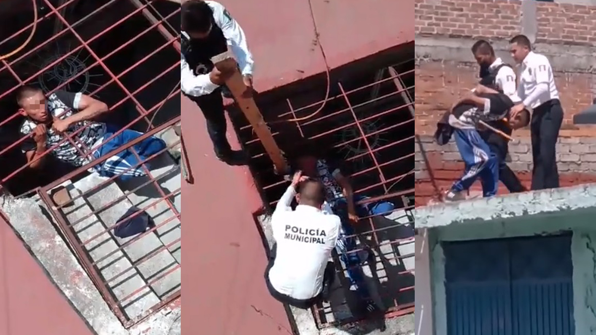 #Video Ladrón queda atorado al intentar robar una casa; policías lo rescatan