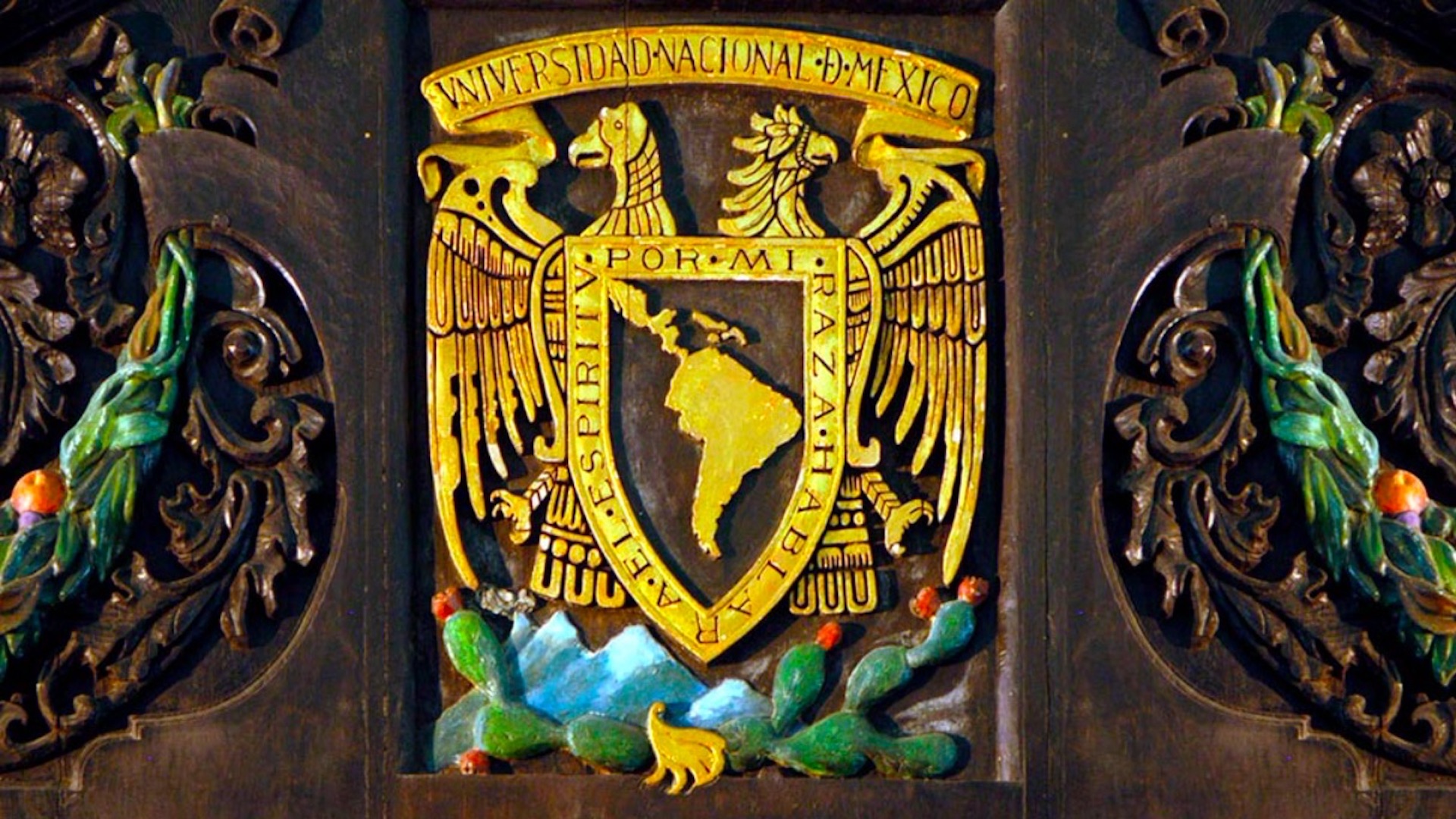 Escudo y lema de la UNAM cumplen 100 años Escudo y lema de la UNAM cumplen 100 años