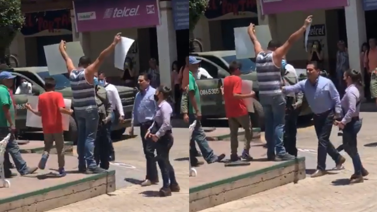 Agrede Aureoles a manifestante en Aguililla; denuncia que era ‘halcón’