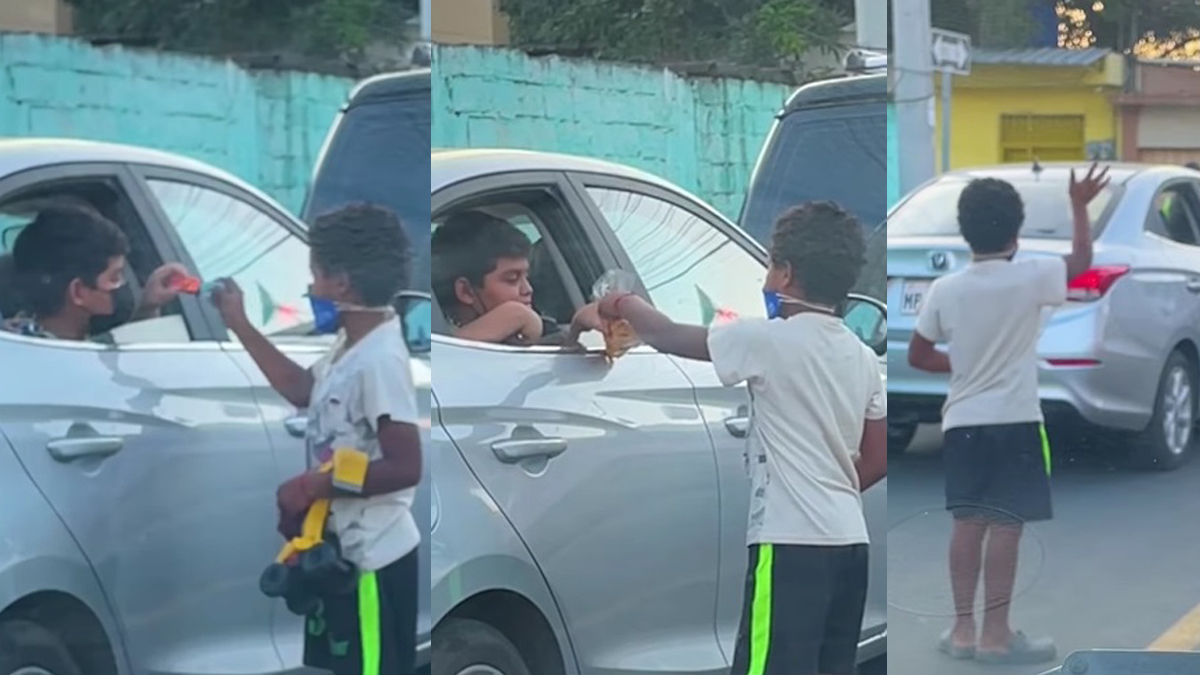 #Video Niño comparte sus juguetes con menor que limpia autos en la calle
