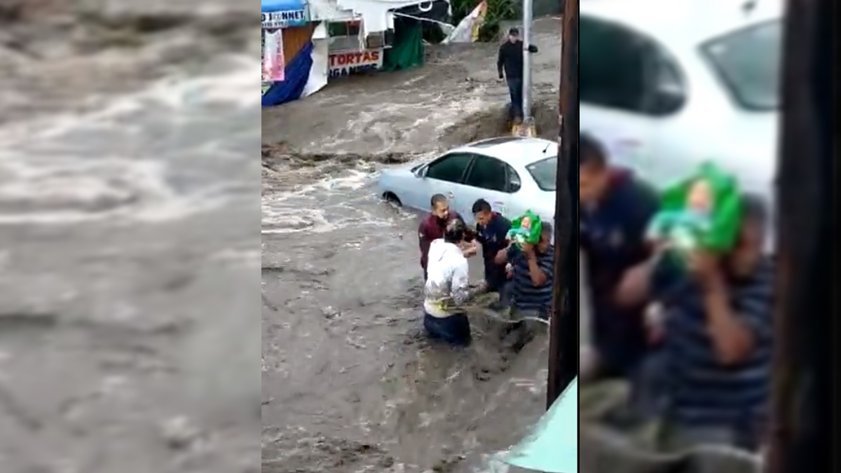#Video Rescatan a bebé de inundaciones en Ecatepec