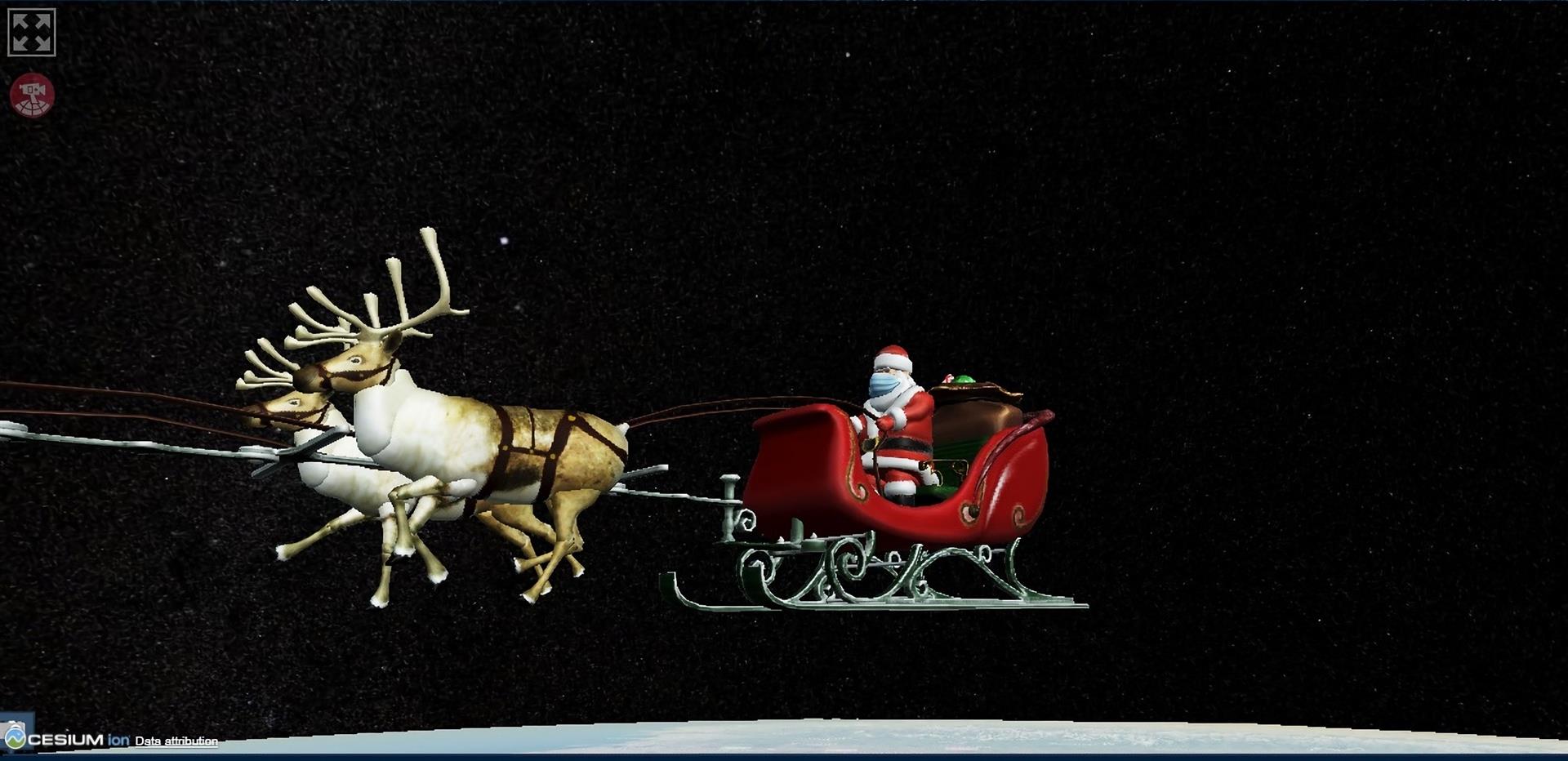 Santa Claus comienza a repartir regalos con la ayuda de sus renos Santa Claus comienza a repartir regalos con la ayuda de sus renos