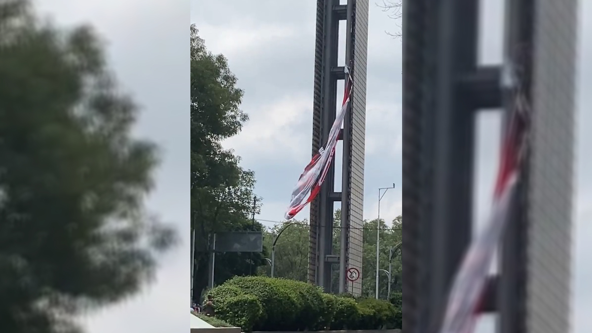#Video Quitan manta monumental contra militarización en Estela de Luz #Video Quitan manta monumental contra militarización en Estela de Luz