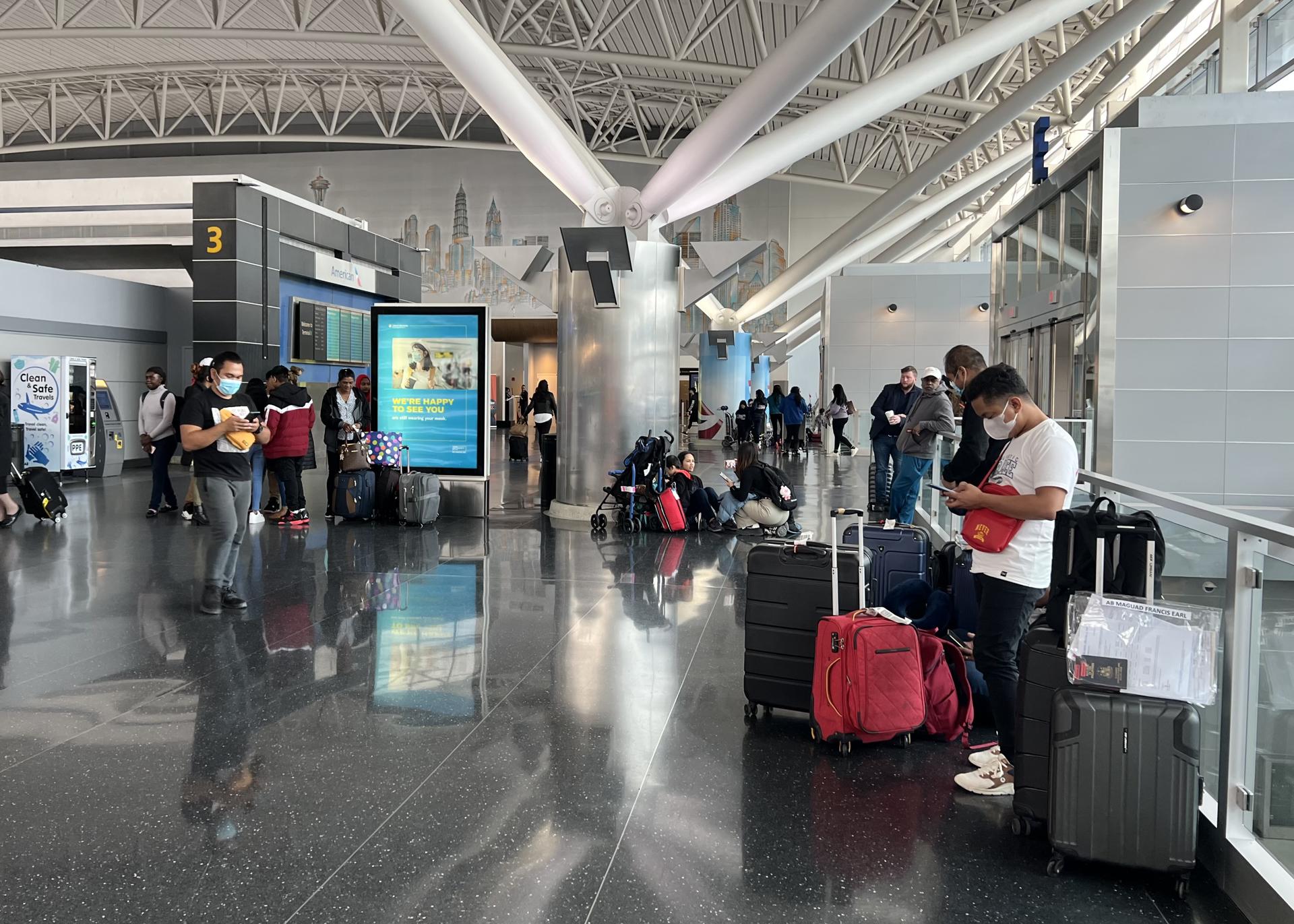 Resignación y dedos cruzados, protagonistas en aeropuertos estadounidenses Resignación y dedos cruzados, protagonistas en aeropuertos estadounidenses