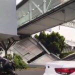 Se desprende techumbre de puente peatonal en la Terminal 1 del AICM; una automovilista resulta lesionada