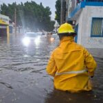 Lluvias en Puebla dejan un muerto y negocios inundados